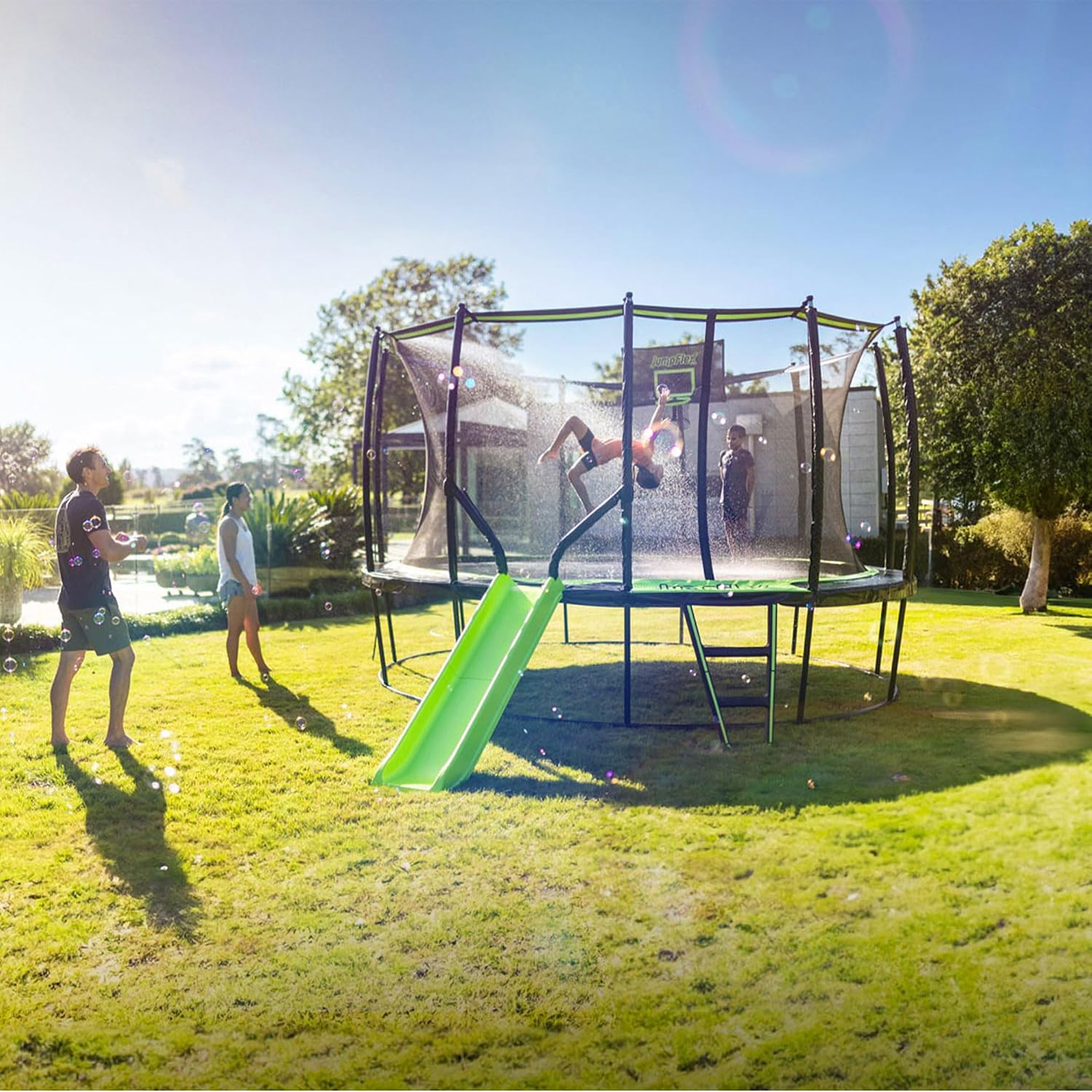 JumpFlex Hero Round Outdoor Backyard Trampoline with Net Safety Enclosure and Ladder - Heavy-Duty Jumping Trampoline Play Equipment for Family